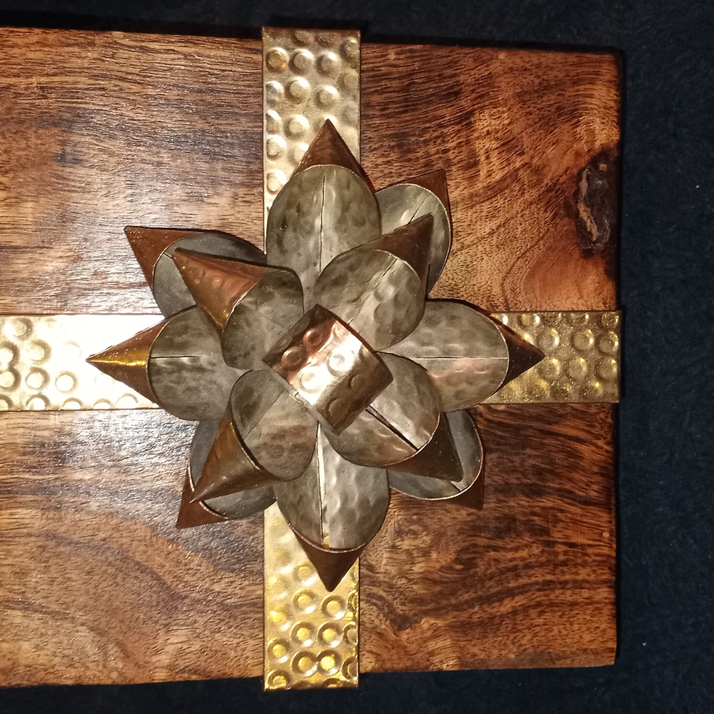 Antique elegant wooden box with Brass ribbon and bow.